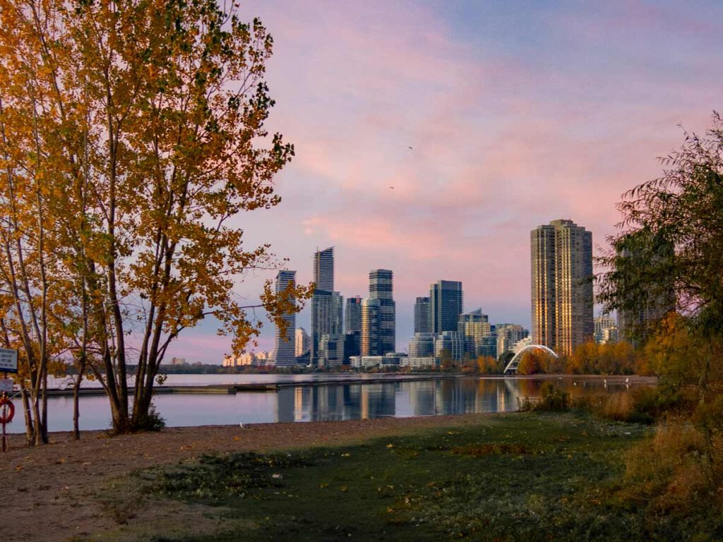 Iconic Honest Ed's dconic Humber Bay sunrise in Toronto - cityscape photo by @mikesimpson.ms